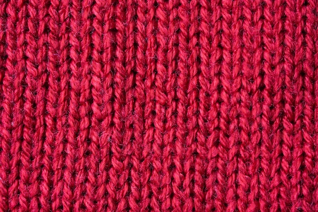 Fond de texture de laine tricotée rouge