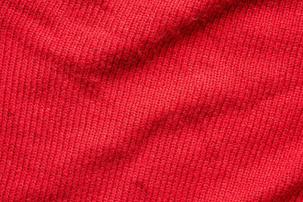 Fond de texture de laine tricotée rouge