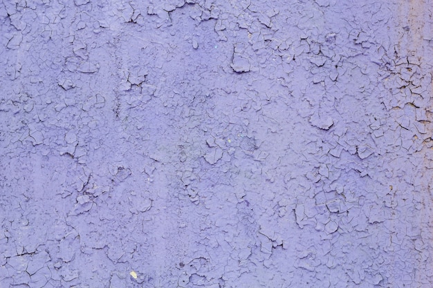 Fond de texture lilas abstraite de la vieille peinture sur plâtre.