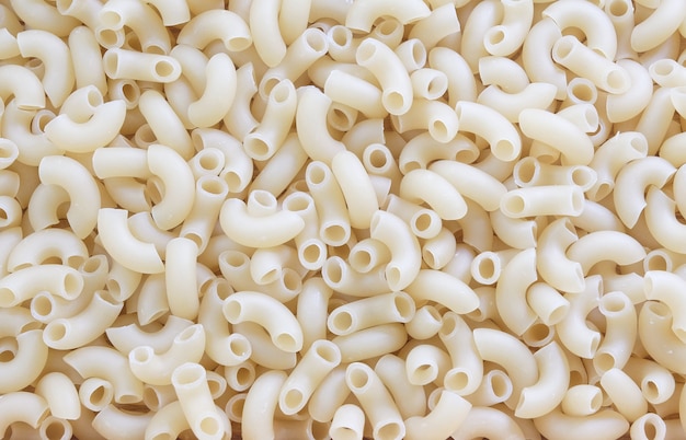 Fond texturé de macaroni au coude ou de pâtes de gomiti