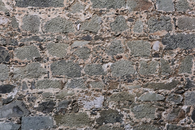 Fond, texture - maçonnerie ancienne au mur du palais médiéval