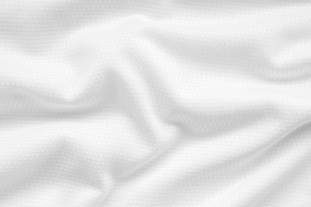 Fond de texture de maillot de maillot de football en tissu de vêtements de sport blanc