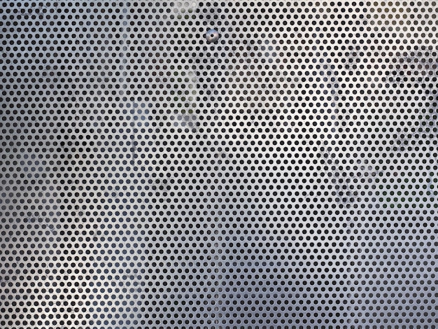 Fond de texture en métal treillis d'acier gris