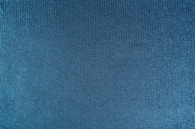 Un fond de texture micro fibre bleu foncé