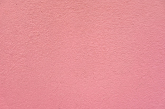 Fond de texture de mur en béton rose.