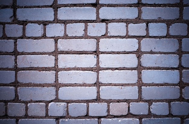 Fond de texture de mur de brique de béton blanc