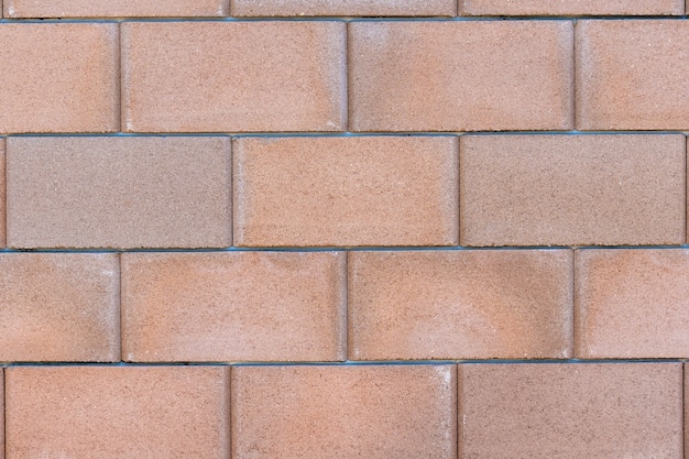 Fond de texture de mur de brique en béton gros, matériau de construction de l'industrie.