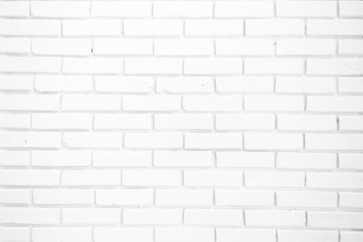 Photo fond de texture de mur de brique blanche