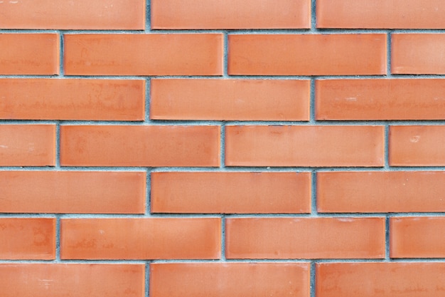 Fond de texture de mur de brique rouge