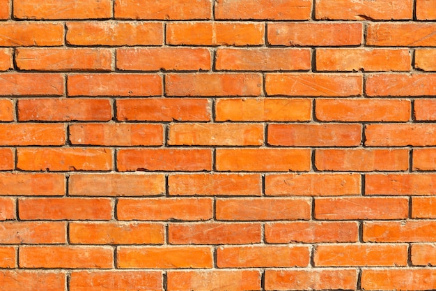 Fond de texture de mur de brique rouge