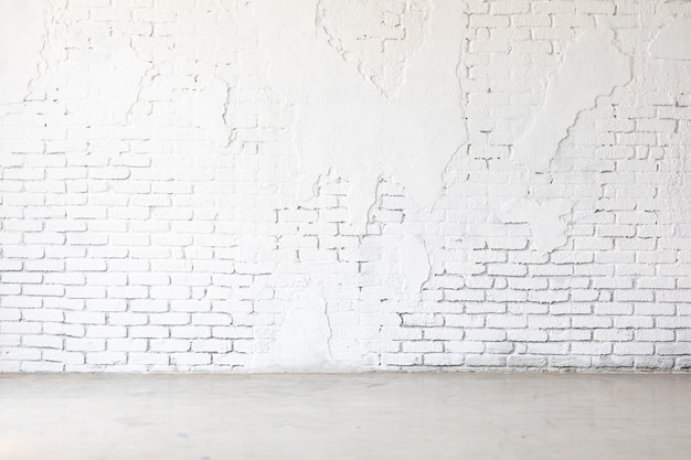 Fond de texture de mur de briques blanches grunge. Arrière-plan pour la conception de bannières maquette.