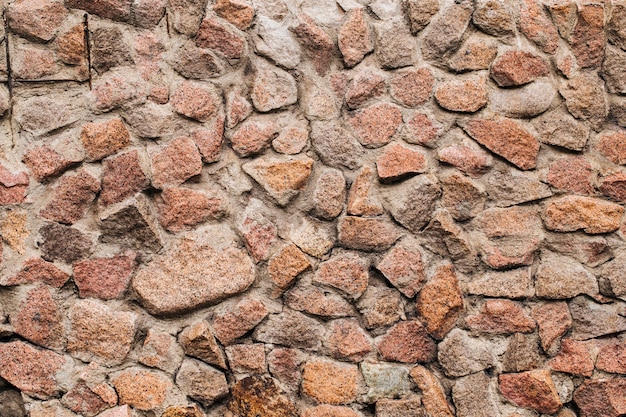 Fond de texture de mur de façade en pierre