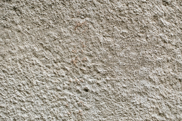 Fond de texture de mur gris pierre ancienne façade