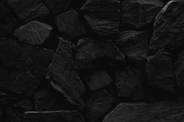 Fond de texture de mur en pierre noire