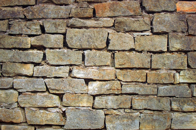 fond de texture de mur de pierre vieilli