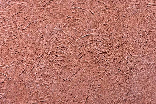 Fond de texture de mur de plâtre orange foncé robuste