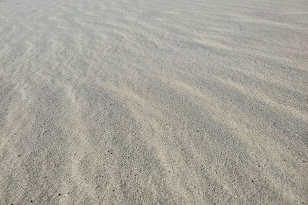 Fond de texture naturelle dunes de sable de sable léger blanc dans le désert