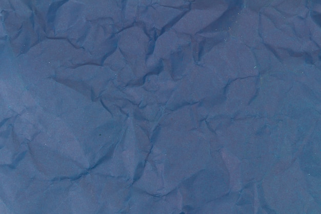 Fond de texture de papier froissé bleu