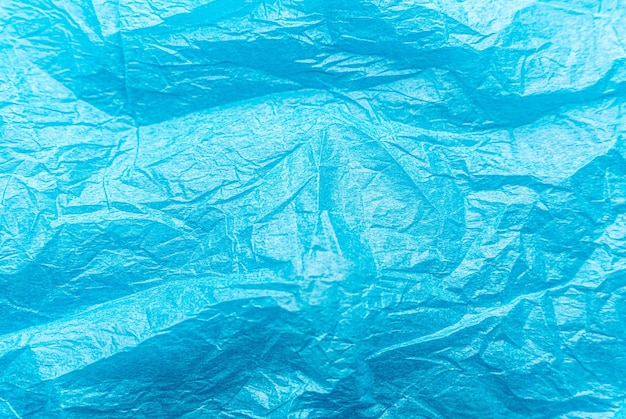 Fond de texture de papier froissé bleu