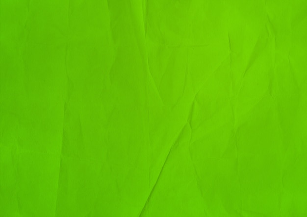 Fond de texture de papier froissé vert