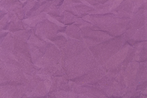 Fond de texture de papier froissé violet