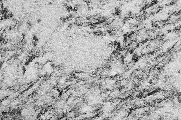 Fond de texture de pierre de granit gris noir et blanc