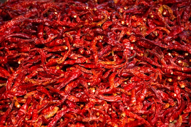 Photo fond de texture de piment rouge sec.