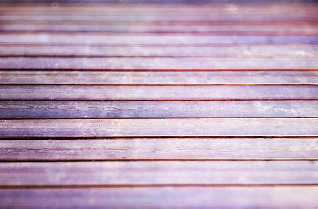 Fond de texture de plancher en bois rougeâtre horizontal