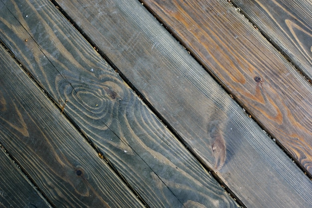 Fond de texture de plancher en bois rustique de couleurs naturelles, rayures diagonales