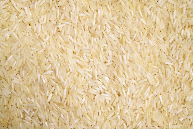 Fond de texture de riz cru