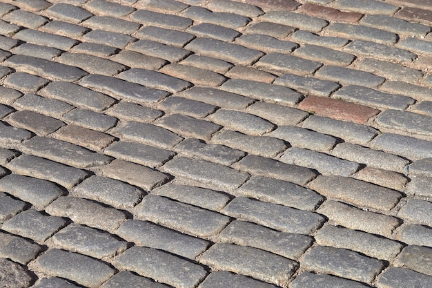 fond de texture de route de chaussée en pierre vintage gris