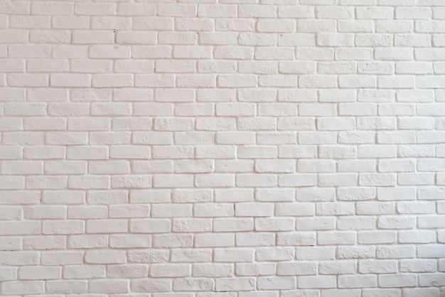 Fond de texture de surface de mur de briques blanches abstraite