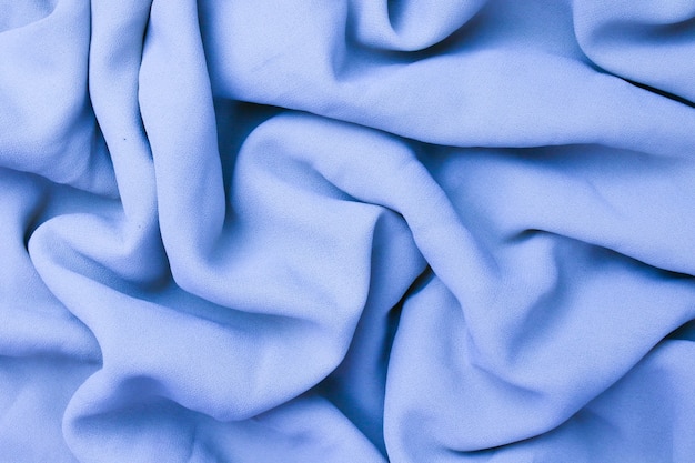 Fond de texture de tissu abstrait aux tons bleus détaillés