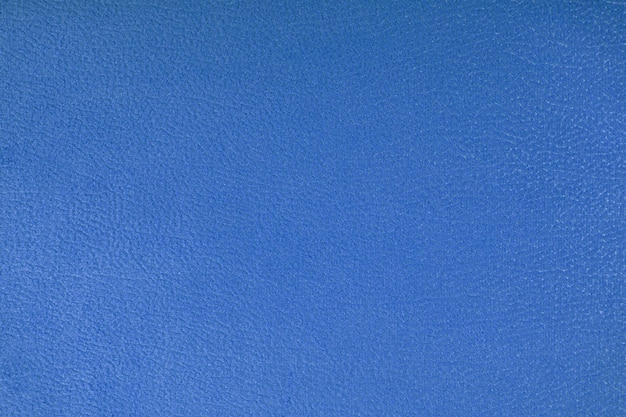 Fond de texture de tissu d'ameublement en velours bleu