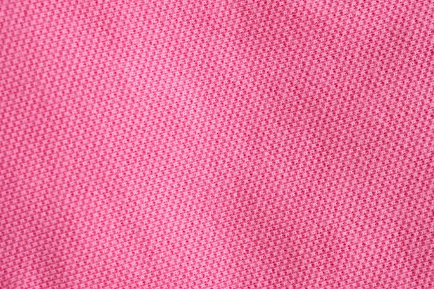 Fond de texture de tissu de coton rose closeup