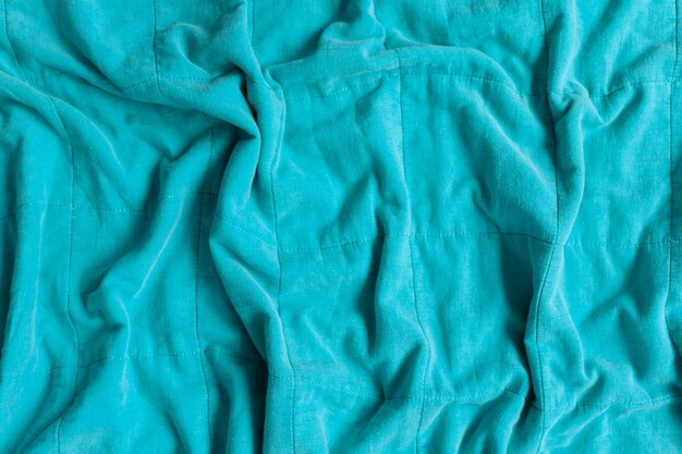 Fond de texture de tissu cyan