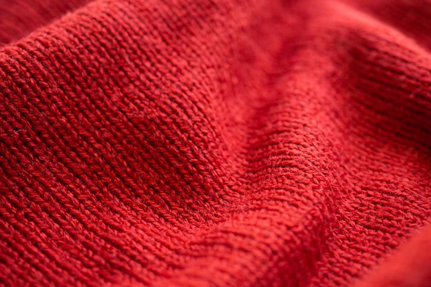 Fond de texture de tissu de laine tricoté rouge gros plan
