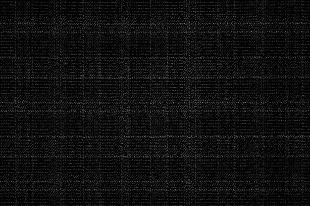 Fond de texture de tissu noir. Détail de la matière textile en toile.