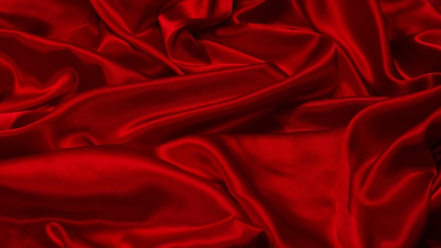 Fond de texture de tissu de soie rouge riche et luxueux. Vue de dessus.
