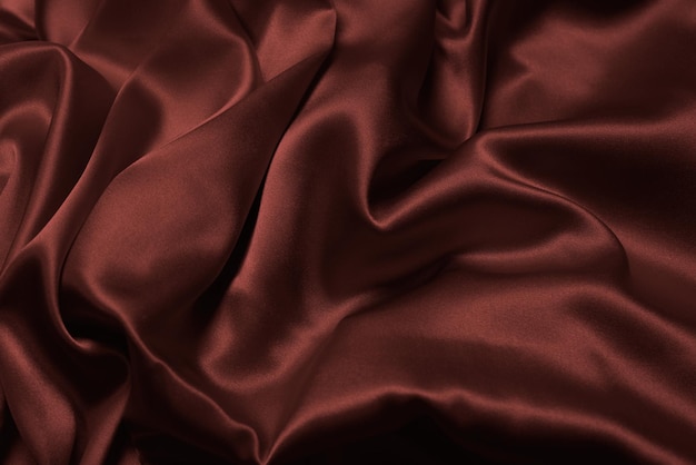 Fond de texture de tissu de soie rouge riche et luxueux Vue de dessus