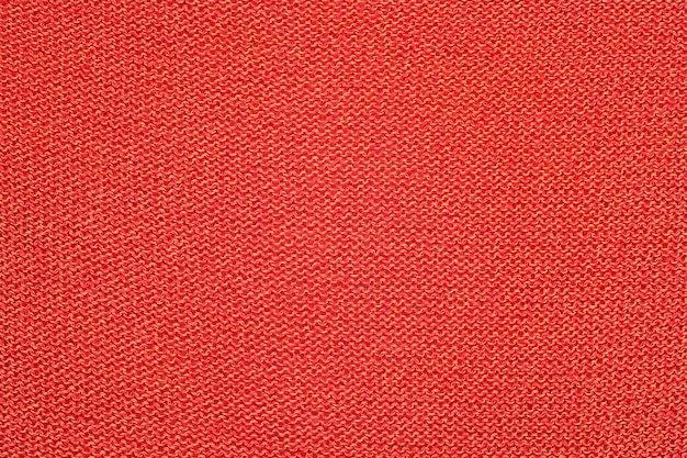 Fond de texture de tissu tricoté orange