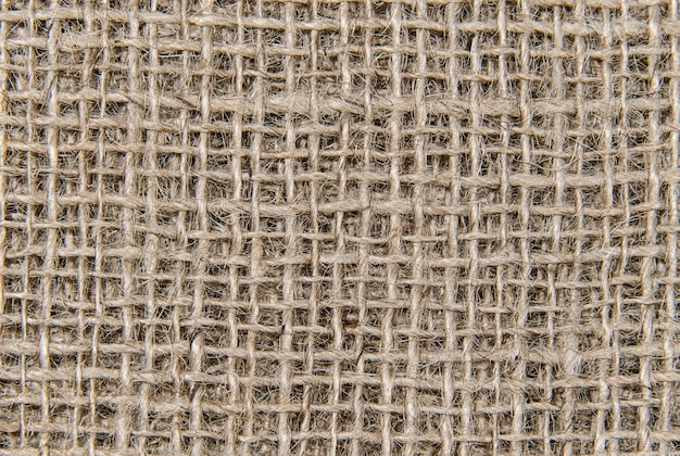 Fond de texture de toile de jute bouchent