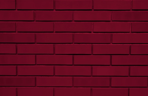 Fond texturé viva magenta de mur de briques