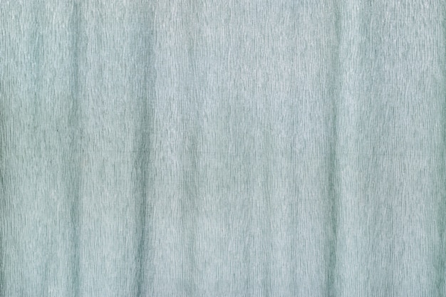 Fond de tissu bleu clair du rideau de la fenêtre