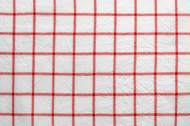 Photo fond de tissu écossais motifs rouges et blancs.