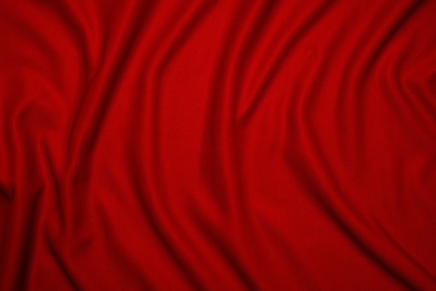 Fond de tissu plié en soie rouge