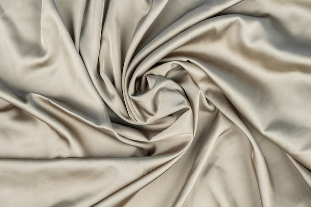 fond de tissu satin de soie beige ondulé ondulé