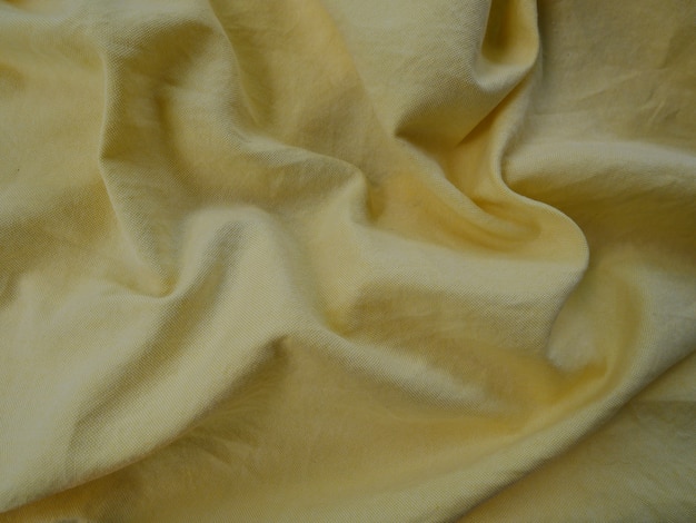 fond de tissu de soie jaune, texture de tissu de coton