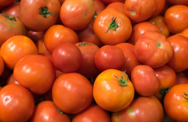 Photo fond de tomates rouges avec un tracé de détourage