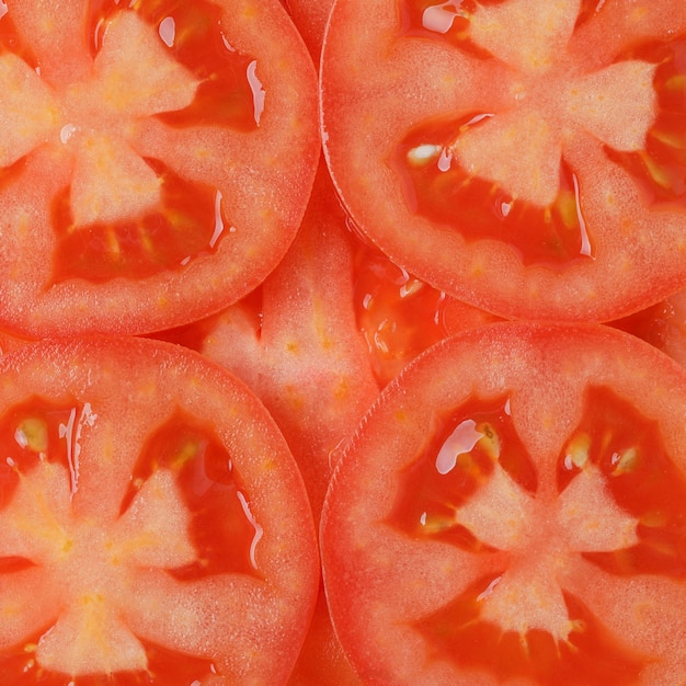 Photo fond en tranches de tomate
